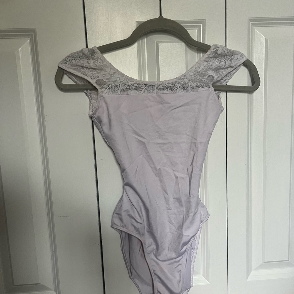 Class in ballet leotard Size S. White lace cap sleeve